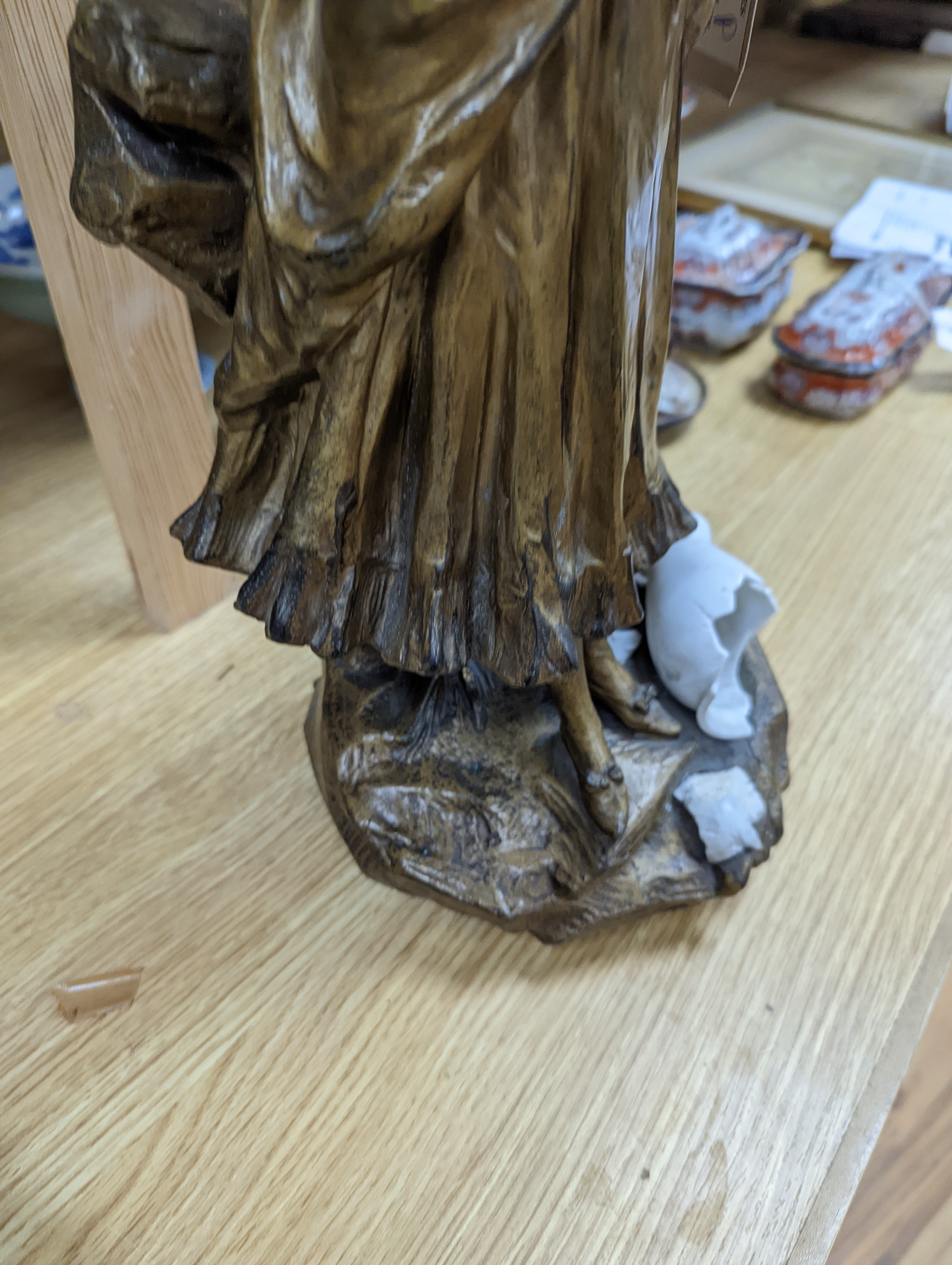 A late 19th Century French gilt spelter and bisque porcelain figure after Mednat 54cm